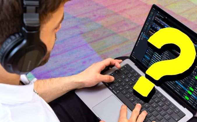 A composite image of a white man wearing headphones, sitting down, and looking at his silver laptop. There's a bright yellow question mark over the laptop screen, obscuring the software underneath.