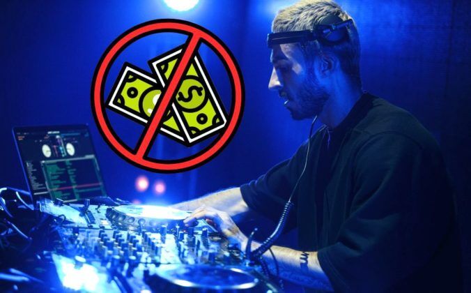 A young white male DJ with short hair and black clothing stands behind a DJ booth in a nighclub, surrounded by professional gear. Floating next to him is a graphic with two green bills crossed out with a red circle icon. The whole photo is bathed in dark blue lighting.